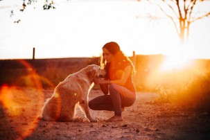 woman with golden retriever, loss of a pet